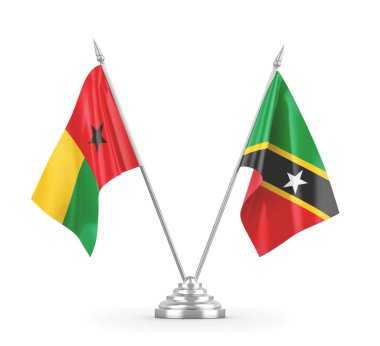 Saint Kitts, Nevis ve Gine-Bissau masa bayrakları beyaz üzerine izole edilmiş.
