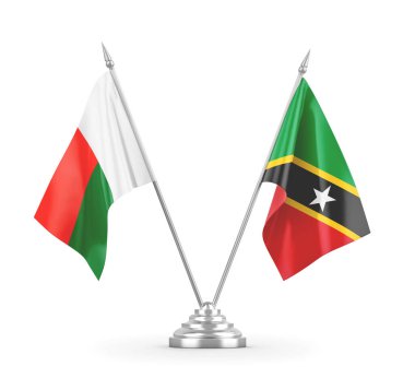 Saint Kitts, Nevis ve Madagaskar masa bayrakları beyaz 3D görüntülerde izole edilmiş.