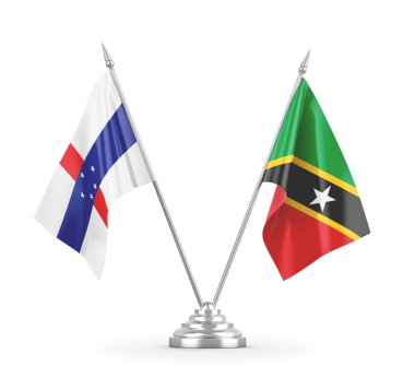 Saint Kitts, Nevis ve Hollanda Antilleri masa bayrakları beyaz üzerine izole edilmiş.