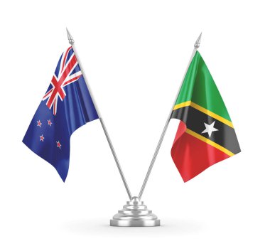 Saint Kitts ve Nevis ve Yeni Zelanda masa bayrakları beyaz 3D görüntüleme üzerinde izole