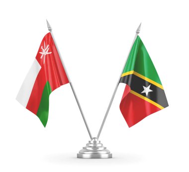 Saint Kitts, Nevis ve Umman masa bayrakları beyaz 3D görüntülerde izole edilmiş.