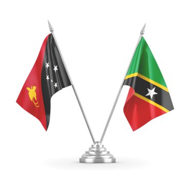 Saint Kitts, Nevis ve Papua Yeni Gine masa bayrakları beyaz üzerine izole edilmiş.