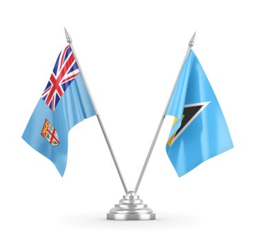 Saint Lucia ve Fiji masa bayrakları beyaz 3D görüntüleme üzerinde izole edildi