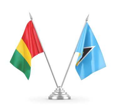 Saint Lucia ve Gine masa bayrakları beyaz 3D görüntüleme üzerinde izole