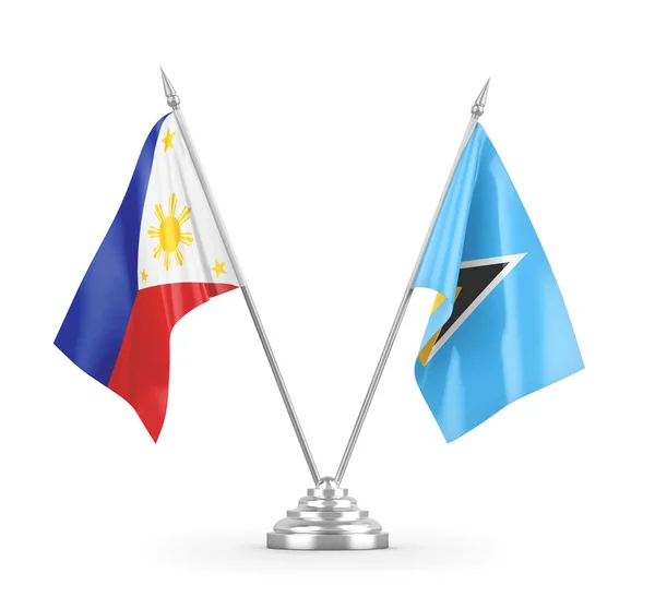 Saint Lucia en Filippijnen tafelvlaggen geïsoleerd op witte 3D rendering — Stockfoto