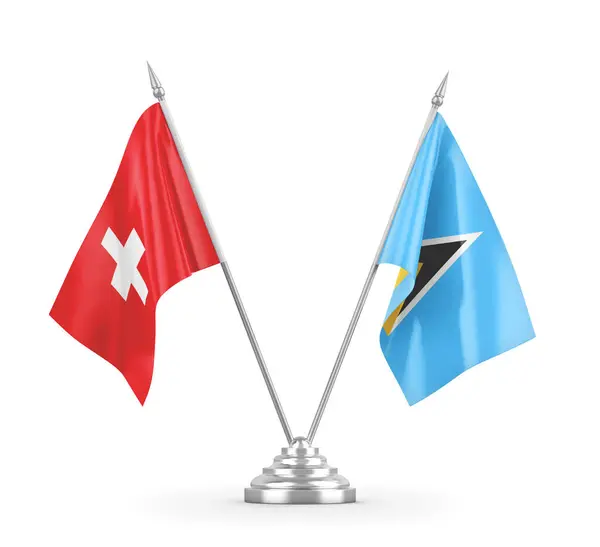 Flagi stołowe Saint Lucia i Szwajcaria izolowane na białym renderingu 3D — Zdjęcie stockowe