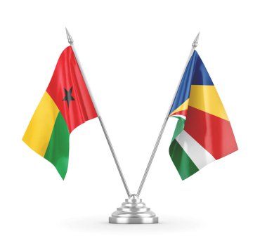 Seyşeller ve Gine-Bissau masa bayrakları beyaz 3D görüntüleme üzerinde izole