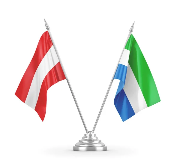 Flagi stołowe Sierra Leone i Austria izolowane na białym renderowaniu 3D — Zdjęcie stockowe