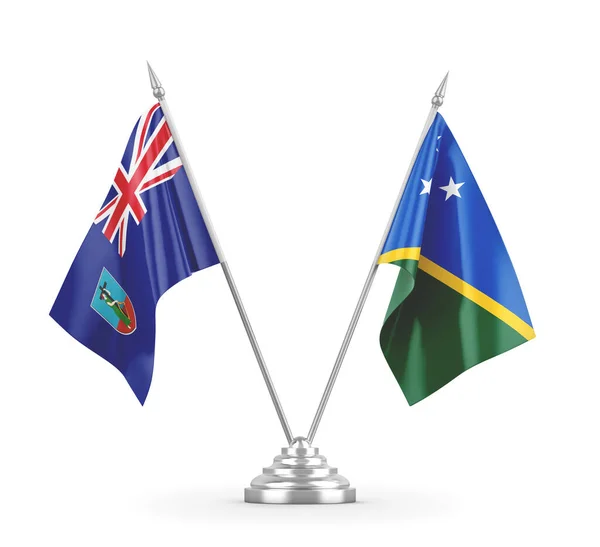 所罗门群岛和蒙特塞拉特在白色3D渲染上隔离的桌旗 — 图库照片