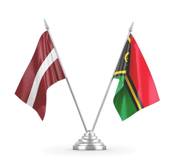 Flagi stołowe Vanuatu i Łotwy izolowane na białym renderowaniu 3D — Zdjęcie stockowe