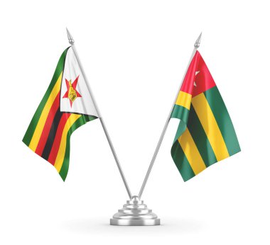 Togo ve Zimbabwe masa bayrakları beyaz 3D görüntüleme üzerinde izole