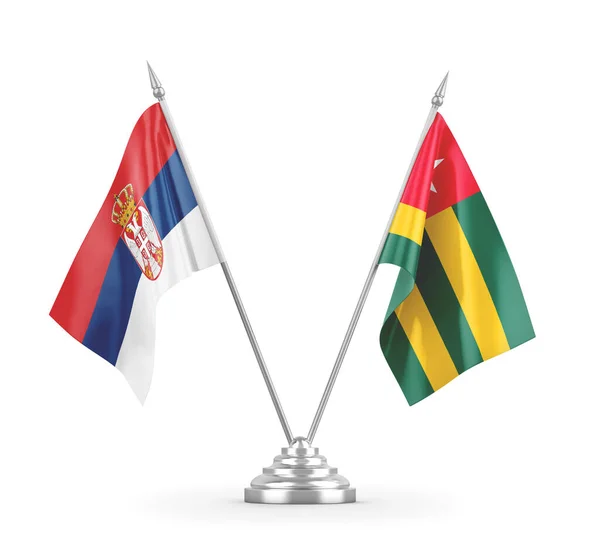 Banderas de mesa Togo y Serbia aisladas en renderizado 3D blanco — Foto de Stock