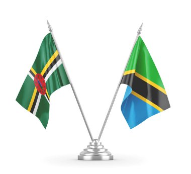 Tanzanya ve Dominika masa bayrakları beyaz 3D görüntüleme üzerinde izole edildi