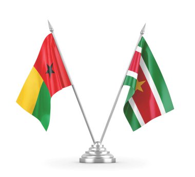 Surinam ve Gine-Bissau masa bayrakları beyaz 3D görüntüleme üzerinde izole
