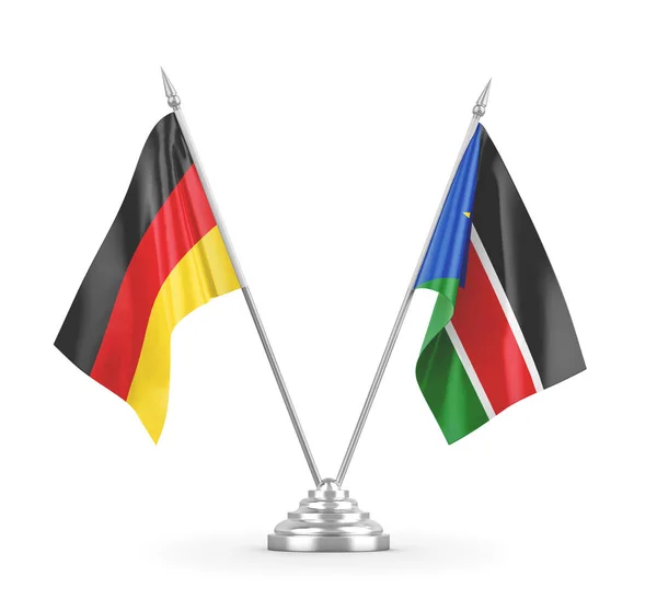 South Sudan and Germany table flags isolated on white 3D rendering — стокове фото