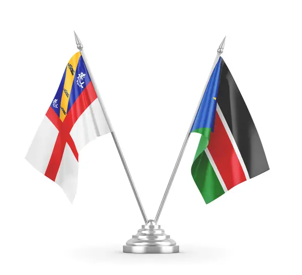 Sydsudan och Herm bordsflaggor isolerade på vit 3D-rendering — Stockfoto