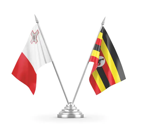 Flagi stołów Ugandy i Malty izolowane na białym renderowaniu 3D — Zdjęcie stockowe