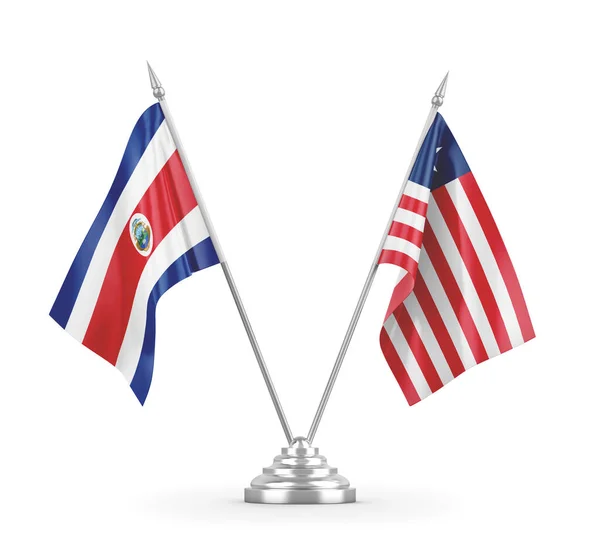 Ліберія і Коста-Рика настільні прапори ізольовані на білому 3D рендерингу — стокове фото