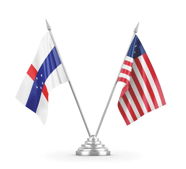 Bandiere da tavolo Liberia e Antille Olandesi isolate su rendering 3D bianco — Foto Stock
