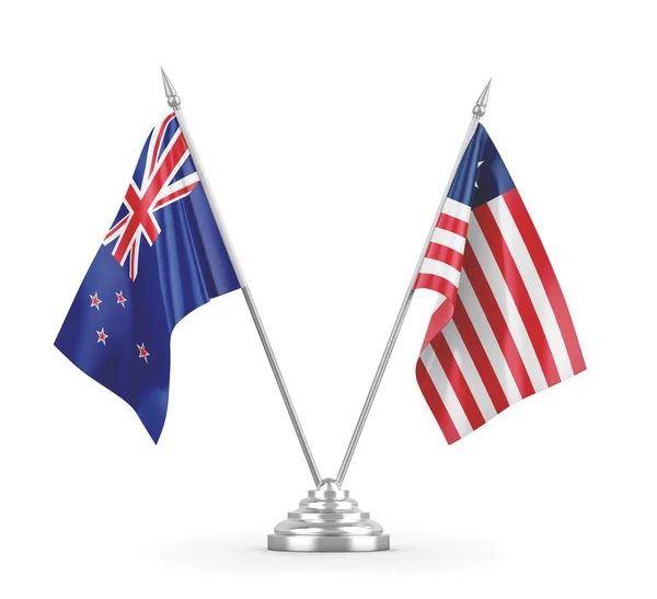 Liberia and New Zealand table flags isolated on white 3D rendering — Stock Photo, Image