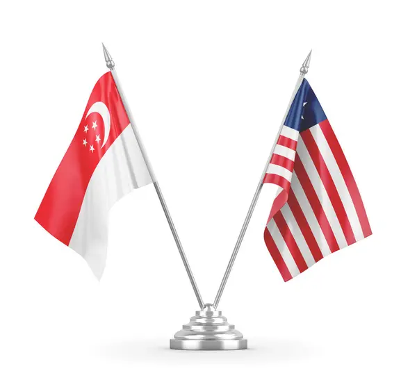白い3Dレンダリングで隔離されたリベリアとシンガポールのテーブルフラグ — ストック写真