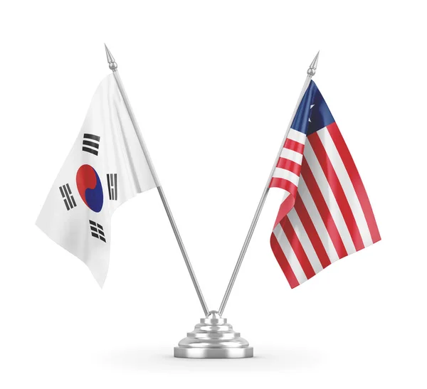 在白色3D渲染中孤立的利比里亚和韩国桌旗 — 图库照片