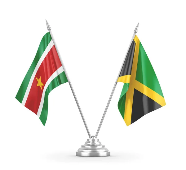 Banderas de mesa Jamaica y Surinam aisladas en renderizado 3D blanco — Foto de Stock