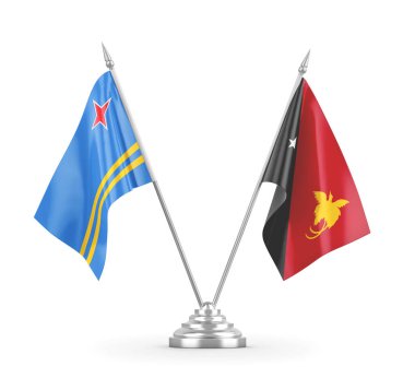 Papua Yeni Gine ve Aruba masa bayrakları beyaz 3D görüntüleme üzerinde izole edildi