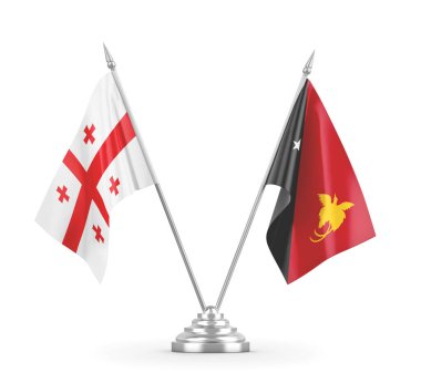 Papua Yeni Gine ve Gürcistan masa bayrakları beyaz 3D görüntüleme üzerinde izole edildi