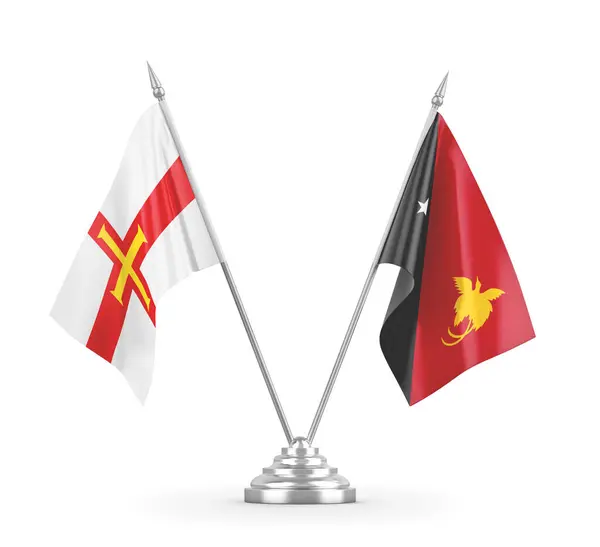 Papua-Nowa Gwinea i flagi tabeli Guernsey izolowane na białym renderingu 3D — Zdjęcie stockowe