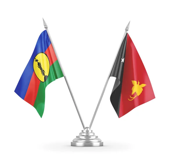 Banderas de mesa Papua Nueva Guinea y Nueva Caledonia aisladas en renderizado 3D blanco — Foto de Stock