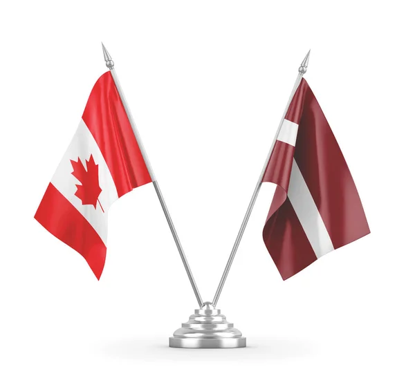 Прапори Латвії та Канади ізольовані на білому 3D рендерингу — стокове фото