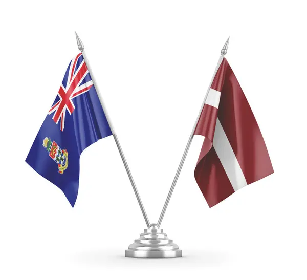 Lotyšsko a Kajmanské ostrovy tabulky vlajky izolované na bílém 3D vykreslování — Stock fotografie