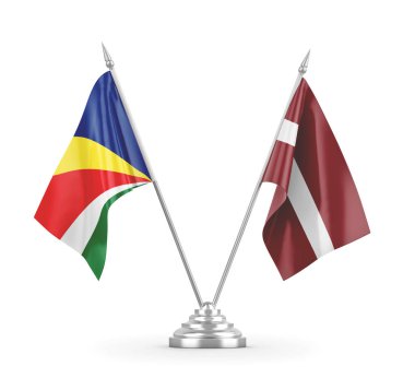 Letonya ve Seyşeller masa bayrakları beyaz 3D görüntüleme üzerinde izole edildi