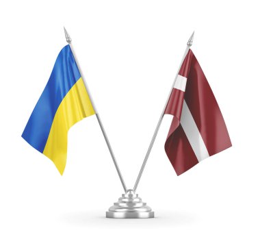 Letonya ve Ukrayna masa bayrakları beyaz 3D görüntüleme üzerinde izole edildi