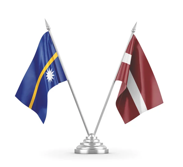 Латвія та Науру - табличні прапори ізольовані на білому 3D рендерингу — стокове фото