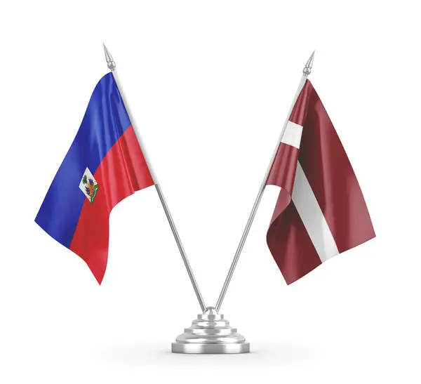 Латвія і Гаїті настільні прапори ізольовані на білому 3D рендерингу — стокове фото