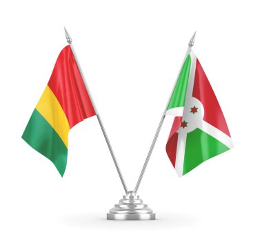 Burundi ve Gine masa bayrakları beyaz 3D görüntüleme üzerinde izole edildi