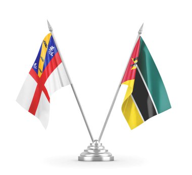 Mozambik ve Herm masa bayrakları beyaz 3D görüntüleme üzerinde izole edildi