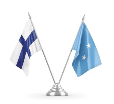 Mikronezya ve Finlandiya masa bayrakları beyaz 3D görüntüleme üzerinde izole edildi