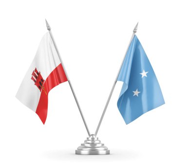 Mikronezya ve Cebelitarık masa bayrakları beyaz 3D görüntüleme üzerinde izole