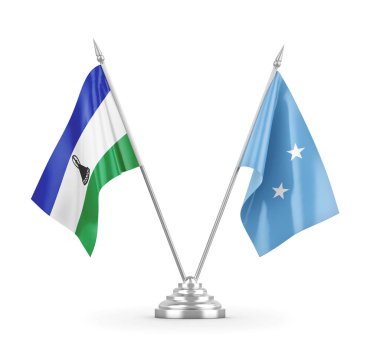 Mikronezya ve Lesotho masa bayrakları beyaz 3D görüntüleme üzerinde izole