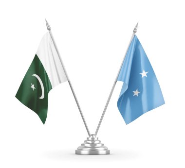 Mikronezya ve Pakistan masa bayrakları beyaz 3D görüntüleme üzerinde izole