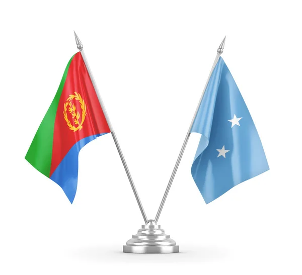 Banderas de mesa Micronesia y Eritrea aisladas en renderizado 3D blanco — Foto de Stock