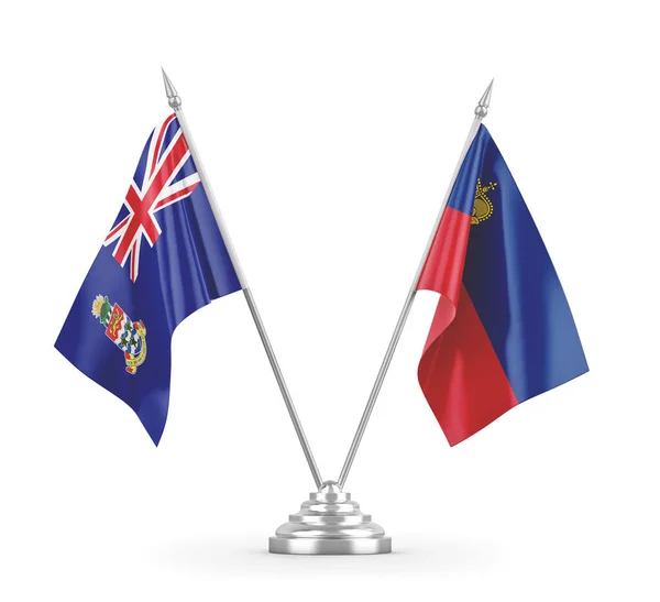 Bandeiras de mesa de Liechtenstein e Ilhas Cayman isoladas em renderização 3D branca — Fotografia de Stock