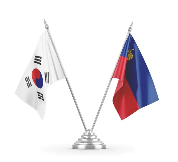 Bandiere da tavolo Liechtenstein e Corea del Sud isolate su rendering 3D bianco — Foto Stock
