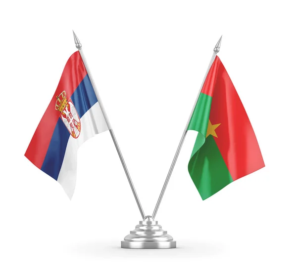 Banderas de mesa Burkina Faso y Serbia aisladas en renderizado 3D blanco — Foto de Stock