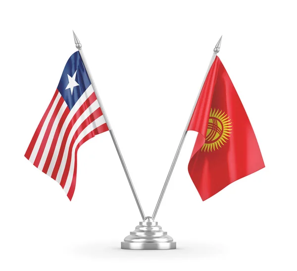 Kyrgyzstan and Liberia table flags isolated on white 3D rendering — Stock Photo, Image