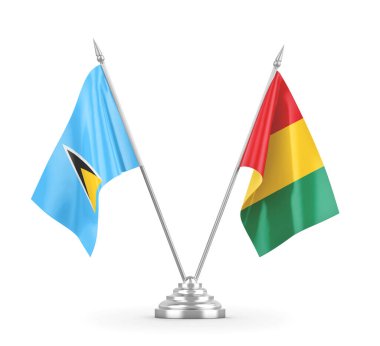 Gine ve Saint Lucia masa bayrakları beyaz 3D görüntülerde izole edilmiştir.