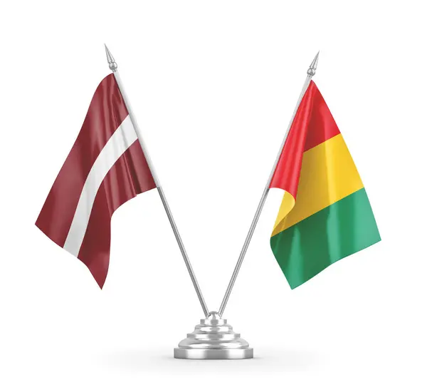 Столи Гвінеї та Латвії ізольовані на білому 3D рендерингу — стокове фото